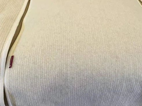Ochraniacz na fotel z wełny merynosów 50 x 200 cm biały